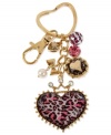 Betsey Johnson makes a heartfelt gesture with this key chain. Crafted from antique gold-tone mixed metal, the key chain features glass and glitter accents, as well as a pink leopard pattern heart to make it truly one to love. Item comes packaged in a signature Betsey Johnson Gift Box. Approximate drop: 1-3/4 inches.