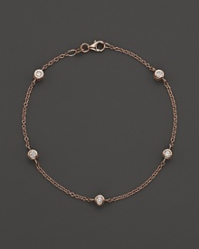 Diamond stations on a fine rose gold chain bracelet.