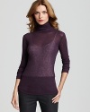 This French Connection turtleneck refreshes your layered looks with the surprise of sheer wool in a regal hue.