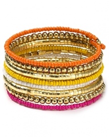 Nail this season's eclectic jewelry trend with beaded coil bracelet from Aqua. Decorated with layers of multi colored beads this colorful piece will work just as well for day as for night. Nail this season's eclectic jewelry trend with beaded coil bracelet from Aqua. Decorated with layers of multi colored beads this colorful piece will work just as well for day as for night.