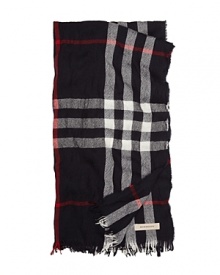Sophisticated, soft and warm, with a classic masculine plaid updated with a crinkled texture: this cashmere & fine merino wool scarf from Burberry effortlessly pairs with a trench. Sophisticated, soft and warm, with a classic masculine plaid updated with a crinkled texture: this cashmere & fine merino wool scarf from Burberry effortlessly pairs with a trench.