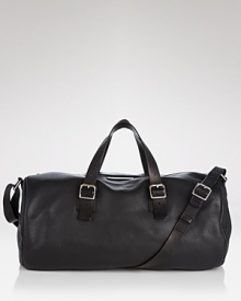 Ready to jet set? Bring along MARC BY MARC JACOBS elegantly simple leather duffel bag to your next far-flung destination. Ready to jet set? Bring along MARC BY MARC JACOBS elegantly simple leather duffel bag to your next far-flung destination.