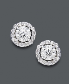 Style fit for a star. Wear this sparkling pair for any occasion, but be prepared to turn heads. Round-cut diamonds (2 ct. t.w.) shine amongst a halo of diamond accents. Crafted in 14k white gold. Approximate diameter: 9-2/10 mm. Style fit for a star. Wear this sparkling pair for any occasion, but be prepared to turn heads. Round-cut diamonds (2 ct. t.w.) shine amongst a halo of diamond accents. Crafted in 14k white gold. Approximate diameter: 9-2/10 mm.