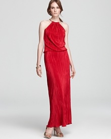 In a brilliant scarlet hue, Laundry by Shelli Segal's ring-neck gown shows off allover micro pleating on a silhouette that's perfectly accessorized with an armful of golden bangles.