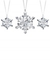 A flurry of sparkle and shine, the Swarovski crystal snowflake ornaments are the essence of holiday splendor. With a silvertone metal charm celebrating 2012 and white satin hanging ribbons.