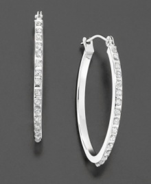 Make a glittering statement. Diamond accents are set along the elegant hoop in 14k white gold. Make a glittering statement. Diamond accents are set along the elegant hoop in 14k white gold.