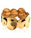 Become a golden goddess with this stretch bracelet from Jones New York. Subtle glass accents add sparkling charm. Stretches to fit wrist. Crafted in gold tone mixed metal.