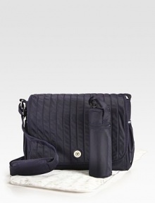 A trim shoulder bag you'd never guess is designed to hold all your baby's essentials.Adjustable shoulder strapMagnetic snap flap closeTwo outside elasticized bottle pocketsTwo inside elasticized open pocketsChanging padSignature wipe-clean liningNylonAbout 16W X 11H X 7DImported A trim shoulder bag you'd never guess is designed to hold all your baby's essentials.Adjustable shoulder strapMagnetic snap flap closeTwo outside elasticized bottle pocketsTwo inside elasticized open pocketsChanging padSignature wipe-clean liningNylonAbout 16W X 11H X 7DImported