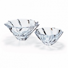 Serve with a twist. Brilliantly cool, clear crystal gets texture and interest, and is the perfect backdrop for brightly hued fruits and vegetables. Matching vases similarly complement lush floral arrangements. Shown left to right: 4 1/2H x 9 7/8 diam. bowl, 3 5/8H x 8 1/8: diam. bowl. Also available: 8 5/8H vase, 9 7/8H vase. Serve with a twist. Brilliantly cool, clear crystal gets texture and interest, and is the perfect backdrop for brightly hued fruits and vegetables. Matching vases similarly complement lush floral arrangements. Shown left to right: 4 1/2H x 9 7/8 diam. bowl, 3 5/8H x 8 1/8: diam. bowl. Also available: 8 5/8H vase, 9 7/8H vase.