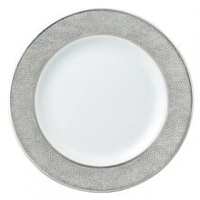 Sauvage bread and butter plate by Bernadaud successfully blends three surprisingly sensual touches - pearl-grey lizard skin, silver filament and interlocking Cordovan honeycombs -- into one truly memorable collection for your table. Exceptional elegance with a touch of the exotic. Sauvage bread and butter plate by Bernadaud successfully blends three surprisingly sensual touches - pearl-grey lizard skin, silver filament and interlocking Cordovan honeycombs -- into one truly memorable collection for your table. Exceptional elegance with a touch of the exotic.
