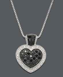 A heart pendant with an extra pop of color. Features a sterling silver setting and chain with a black diamond center and bale (3/8 ct. t.w.) surrounded by white diamond edges (1/8 ct. t.w.) Approximate length: 18 inches. Approximate drop: 3/4 inch. A heart pendant with an extra pop of color. Features a sterling silver setting and chain with a black diamond center and bale (3/8 ct. t.w.) surrounded by white diamond edges (1/8 ct. t.w.) Approximate length: 18 inches. Approximate drop: 3/4 inch.