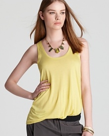 A flowing silhouette lends easy style to this Vince tank, rendered in a vivid yellow for sunny day style.