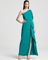 BCBGMAXAZRIA masters modern glamour with this floor-sweeping gown, boasting a one-shoulder silhouette and cascading skirt.