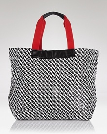Take your penchant for prints seaside with this canvas tote from DIANE von FURSTENBERG. Sized to stow your sun bathing essentials, it's a beach babe's must. Take your penchant for prints seaside with this canvas tote from DIANE von FURSTENBERG. Sized to stow your sun bathing essentials, it's a beach babe's must.
