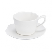 An organically scalloped, off-white dinnerware pattern that contributes elements of both texture and design to your dining experience. An organically scalloped, off-white dinnerware pattern that contributes elements of both texture and design to your dining experience.
