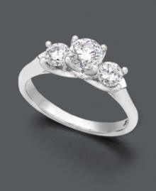 Make her heart melt thrice over. This stunning three stone engagement ring features luminous round-cut diamonds - one sparkling center diamond (1/2 ct. t.w.) and two bordering diamonds (1/4 ct. t.w.). Ring crafted in a polished 18k white gold setting. IGI Certified diamonds. Make her heart melt thrice over. This stunning three stone engagement ring features luminous round-cut diamonds - one sparkling center diamond (1/2 ct. t.w.) and two bordering diamonds (1/4 ct. t.w.). Ring crafted in a polished 18k white gold setting. IGI Certified diamonds.