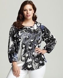 This flowing Tahari Woman printed top is lavished in a black-and-white peacock design for an original way to wear the season's requisite animal prints. Pair this striking piece over color-surge denim for an eye-catching day or evening look. This flowing Tahari Woman printed top is lavished in a black-and-white peacock design for an original way to wear the season's requisite animal prints. Pair this striking piece over color-surge denim for an eye-catching day or evening look.