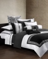 Lined with beautiful, Eastern-inspired embroidery in stark white over black, this Indochine runner tops this bedding ensemble with modern sleekness.