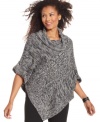 Snuggle into Karen Scott's so-soft poncho. Cable-knit at the front and a cowl neckline make it an autumn-ready staple, perfect for pairing with skinny pants!