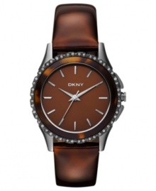 An captivating casual watch from DKNY with gunmetal and tortoise accents. An captivating casual watch from DKNY with gunmetal and tortoise accents.