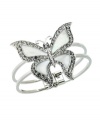 It's high-time to let your style soar. GUESS bracelet highlights a large butterfly with Mother of Pearl wings edged with sparkling, round-cut crystals. Crafted in silver tone mixed metal. Approximate diameter: 2 inches.