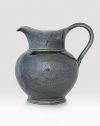A unique mottling technique lends a hand-thumbed, hammered design to a beautiful metallic pewter pitcher with the look of an old-world favorite. 2.2-quart capacity 8 high Dishwasher safe Imported