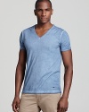 Update your basics with a fashionably worn-in light blue tee from BOSS Orange.