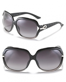 Go for a wow factor in chic oversized round sunglasses with gradient frames and pretty textured arms.