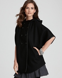 The covetable DKNY cape silhouette takes jacket form as your go-to layer for a fashion-forward winter.