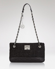 DKNY's leather and tweed shoulder bag channels ladylike style for all occasions. DKNY's leather and tweed shoulder bag channels ladylike style for all occasions.