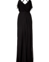 Glamorous, floor-length evening gown of fine black silk - Features ruffle trim at the neckline, decorative crystal-studded carrier, and deep, sexy back with crossed strapped - Pleats and mini train create refined, luxurious look - Wear with sandals and matching clutch