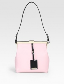 This elegant leather style features a sleek colorblocked design with a detachable logo tag.Shoulder strap, 10 dropTop clasp closure8W X 8H X 3¾DMade in Italy This elegant leather style features a sleek colorblocked design with a detachable logo tag.Shoulder strap, 10 dropTop clasp closure8W X 8H X 3¾DMade in Italy