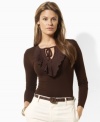 Lauren by Ralph Lauren's petite, sleek jersey top is given a feminine feel with charmeuse ruffles at the scoop neckline.