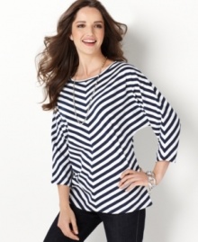 Striking stripes and chic dolman sleeves come together for petite weekend style from Charter Club! The relaxed fit makes it a perfect match with slim pants. (Clearance) Striking stripes and chic dolman sleeves come together for petite weekend style from Charter Club! The relaxed fit makes it a perfect match with slim pants. (Clearance)