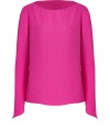 Take a minimalist stance on sophistication in Tara Jarmons bright tunic top, complete with asymmetrical cuffs for an understated modern finish - Rounded-neckline, long sleeves, slim silhouette - Style with skinny jeans, tailored business separates, or cropped trousers, and finish with ballerinas or sky-high pumps