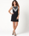 Nine West delivers two of the season's hottest looks in one stunning matte jersey dress: A feather-inspired print is on-trend with animal-inspired notions and rows of sequins provide the shine that's so in right now. (Clearance)