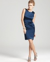 Intricate ruching and a metallic sheen lend major glamour to this body-con Nicole Miller sheath dress.
