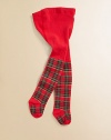 Opaque, stretch tights adorned with a festive tartan print.Elastic waistSmooth from waist to hips49% polyester/48% cotton/3% spandexMachine washMade in USA