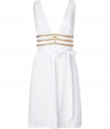 Add stylish drama to your cocktail look with this stunning dress from Azzaro - Deep V-neck and back, fitted waist with gold band detailing, full wrap skirt - Wear with gold-tone platform pumps, a studded clutch, and layered necklaces