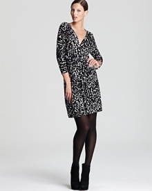 In sophisticated shades of black and white, an abstract-print DKNY dress adds a punch of modernity to your 9-to-5 style routine. Punctuate the tonal silhouette with acid-bright accents for real edge. In sophisticated shades of black and white, an abstract-print DKNY dress adds a punch of modernity to your 9-to-5 style routine. Punctuate the tonal silhouette with acid-bright accents for real edge.