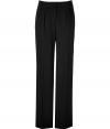 Luxurious pants made ​.​.of fine black wool stretch - New elegant silhouette with straight, wide legs as well as waist and pleats - Short waistband and side pockets - A classic AND a modern look that works fantastic for the office and leisure - Looks grown up, professional and dressed up - A classy basic that is suitable with blouses, tops, cardigans