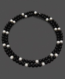 Let the sheer beauty of black and white enchant any outfit. This necklace features luminous cultured freshwater pearls (8-9 mm) and onyx (8-9 mm). Approximate length: 36 inches. Let the sheer beauty of black and white enchant any outfit. This necklace features luminous cultured freshwater pearls (8-9 mm) and onyx (8-9 mm). Approximate length: 36 inches.
