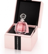 Flowerbomb is a floral explosion, a profusion of flowers that has the power to make everything more positive. Flowerbomb returns to the original, intimate gesture of perfume with an overdose of noble patchouli and reinforced gourmand facets to bring a new intensity to the delicious Flowerbomb fragrance. The new Extrait de Parfum, a bewitching and long-lasting concentrate, is presented in a luxurious jewelry box to reveal the delicately hand-packaged diamond bottle inside. 0.67 oz.
