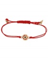 Eye your new favorite bracelet. This RACHEL Rachel Roy bracelet showcases an evil eye charm with glass stone accents. An adjustable red waxed cotton cord holds it all together. Set in worn gold tone mixed metal. Approximate diameter: 1/4 inch. Adjustable from 1 inch to 7-1/4 inches.