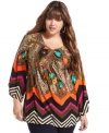 Get standout style this season with One World's three-quarter-sleeve plus size top, flaunting a mixed-print!