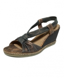Get back to your roots. Distressed fabric lends an earthy vibe to the wear-everywhere Pola wedges by Donald J Pliner. Get back to your roots. Distressed fabric lends an earthy vibe to the wear-everywhere Pola wedges by Donald J Pliner.