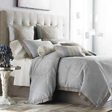 Elegant, all-over embroidered scroll pattern with contrasting flange for duvet and shams. Elegant, all-over embroidered scroll pattern with contrasting flange for duvet and shams.