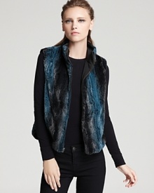 In fall-perfect ombre, this Aqua faux fur vest tops off your new collection with edge for a season of playful glamour. In fall-perfect ombre, this Aqua faux fur vest tops off your new collection with edge for a season of playful glamour.