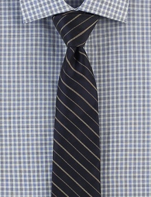 An elegant dress essential woven in fine, striped silk.SilkDry cleanMade in USA An elegant dress essential woven in fine, striped silk.SilkDry cleanMade in USA