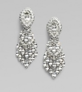 A sparkling silver plated design. Swarovski crystals Silver plated rhodium Size, about 2¾ X 1 Brass clip back Made in USA 